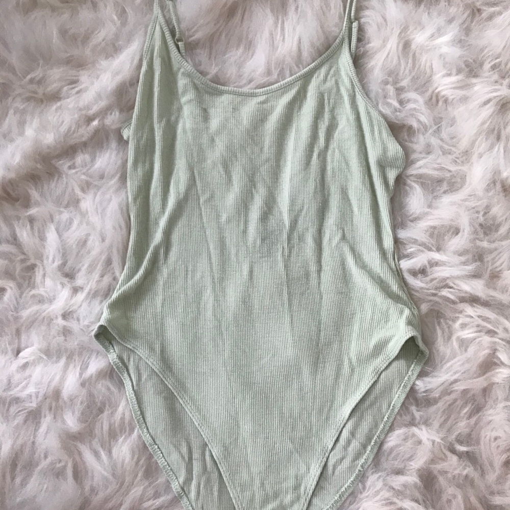 Pastel green low back body suit